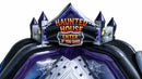 Close up of the HAUNTED HOUSE ENTER IF YOU DARE sign above the white climbing wall and printed spiderwebs