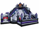 Haunted House Challenge from the front corner, red flame shapes in the near lane and the climb wall behind